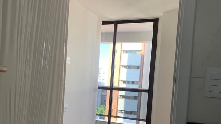 Bright apartment room with balcony door