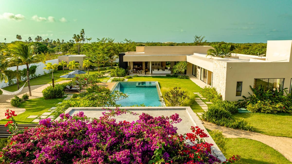 Aerial view of the villa, pool and tropical gardens in Jericoacoara