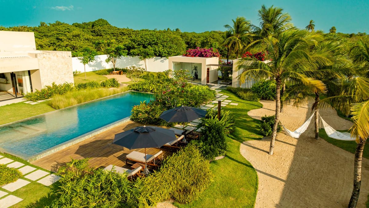 Pool deck, tropical garden and hammocks