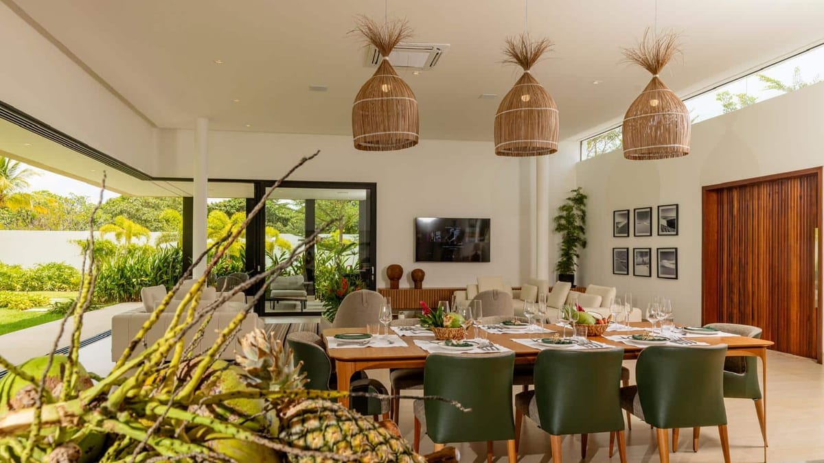 Open-plan dining and living area overlooking the garden