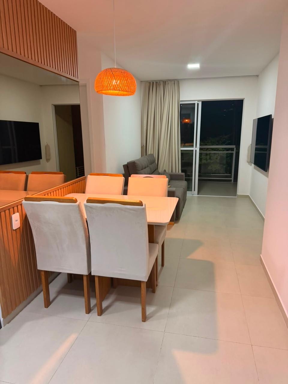 Integrated living and dining room with access to the balcony